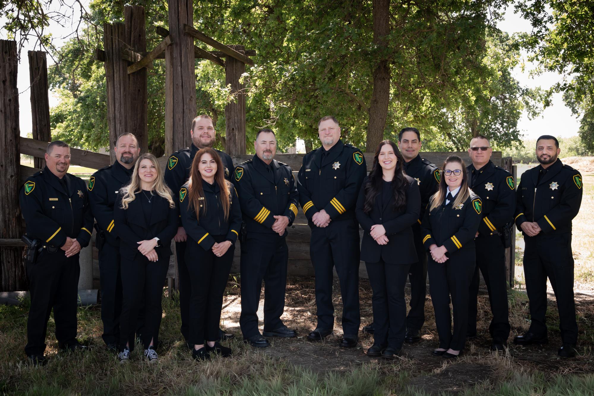 Command Staff - 12 individuals in professional attire, posing for group photo